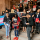 TS Candii, middle, speaking inside the New York State Capitol building in Albany, N.Y., on Tuesday, May 8, 2019.